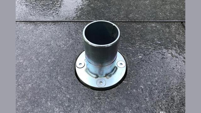 Umbrella base in the ground.