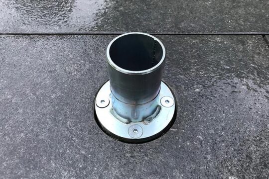 Umbrella base in the ground.